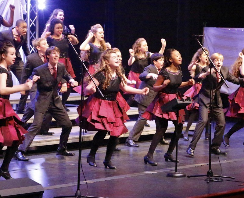 Students performing on stage