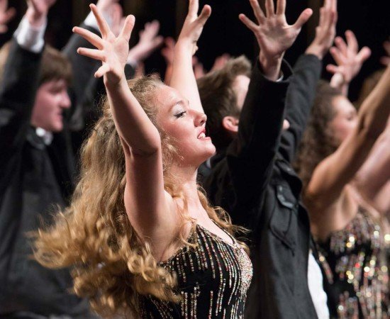 A student performing in show choir