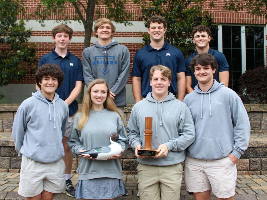 Students display the 2022-23 Ducks Unlimited Duck Bowl Trophy.
